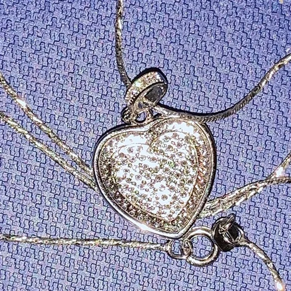 New 1/10 carat paved diamond necklace in sterling silver